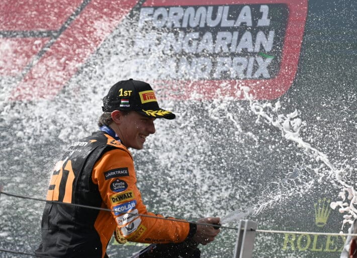 epa11490391 McLaren driver Oscar Piastri of Australia celebrates on the podium after winning the Formula One Hungarian Grand Prix at the Hungaroring circuit, in Mogyorod, near Budapest, 21 July 2024.  EPA-EFE/Tamas Kovacs HUNGARY OUT