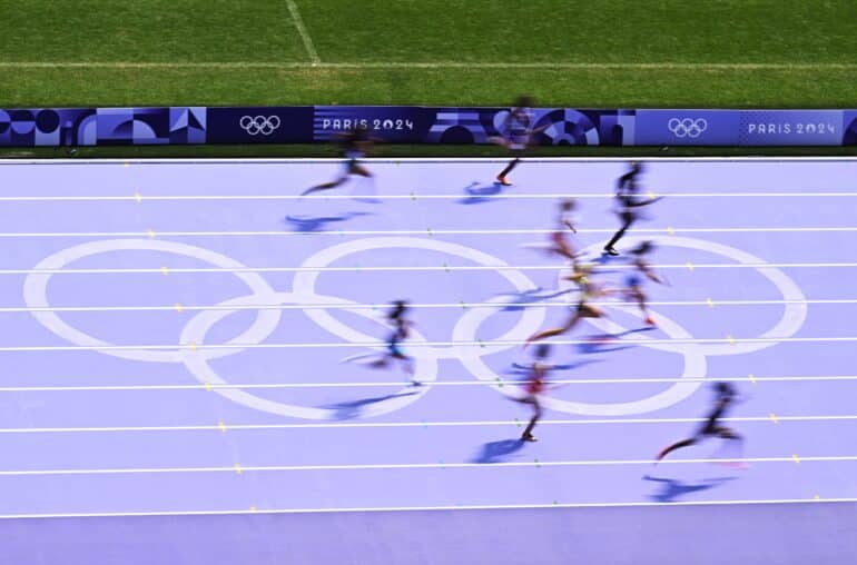 The Olympic Rings pictured on the track during the Women's 100m round 1 of the athletics competition at the Paris 2024 Olympic Games, on Friday 02 August 2024 in Paris, France. The Games of the XXXIII Olympiad are taking place in Paris from 26 July to 11 August. The Belgian delegation counts 165 athletes competing in 21 sports.