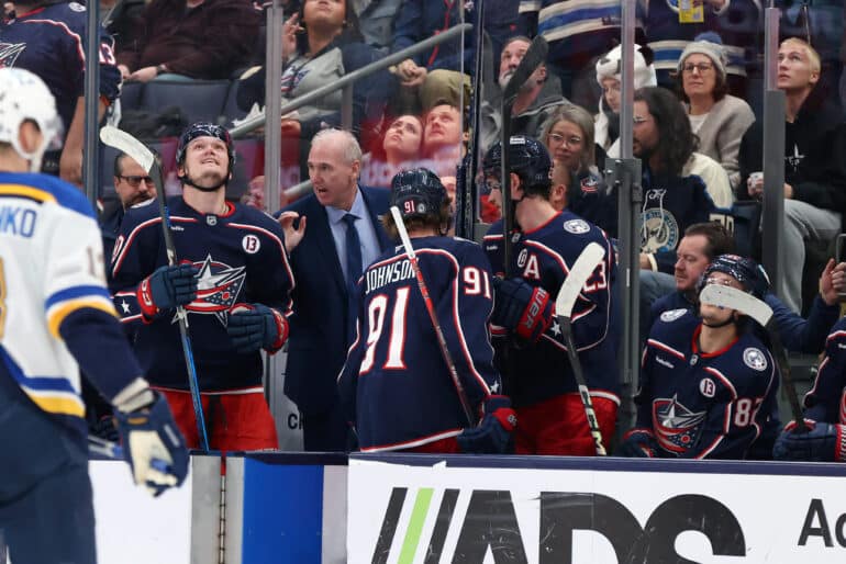 Jan 4, 2025; Columbus, Ohio, USA;  Columbus Blue Jackets head coach Dean Evason congratulates his players after a goal during the second period against the St. Louis Blues at Nationwide Arena. Mandatory Credit: Joseph Maiorana-Imagn Images