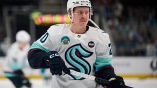 Apr 5, 2025; San Jose, California, USA; Seattle Kraken right wing Eeli Tolvanen (20) warms up before the game against the San Jose Sharks at SAP Center at San Jose. Mandatory Credit: Robert Edwards-Imagn Images