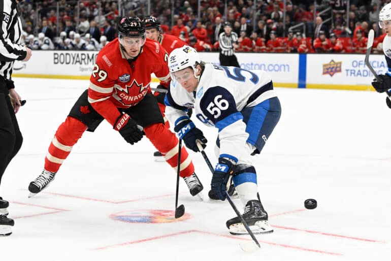 XXKEIKKAXX  February 17, 2025, Boston, MA, USA: Team Finland forward Erik Haula (56) faces off against Team Canada forward Nathan MacKinnon (29) during the second period of the 4 Nations Face Off game  at TD Garden. Eric Canha All Over Press