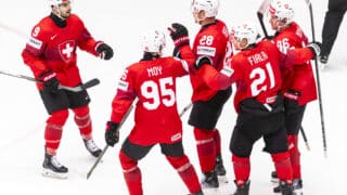 epa12125944 Switzerland's forward Timo Meier #28 celebrates his goal with his teammates Switzerland's forward Damien Riat #9, Switzerland's forward Tyler Moy #95 Switzerland's forward Kevin Fiala #21 and Switzerland's defender Janis Jerome Moser #86, after scoring the 2:0, during the 2025 IIHF Ice Hockey World Championship quarter final match between Switzerland and Austria, at the Jyske Bank Boxen, in Herning, Denmark, 22 May 2025.  EPA-EFE/SALVATORE DI NOLFI