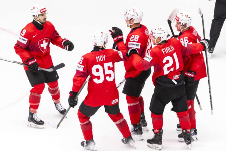 epa12125944 Switzerland's forward Timo Meier #28 celebrates his goal with his teammates Switzerland's forward Damien Riat #9, Switzerland's forward Tyler Moy #95 Switzerland's forward Kevin Fiala #21 and Switzerland's defender Janis Jerome Moser #86, after scoring the 2:0, during the 2025 IIHF Ice Hockey World Championship quarter final match between Switzerland and Austria, at the Jyske Bank Boxen, in Herning, Denmark, 22 May 2025.  EPA-EFE/SALVATORE DI NOLFI