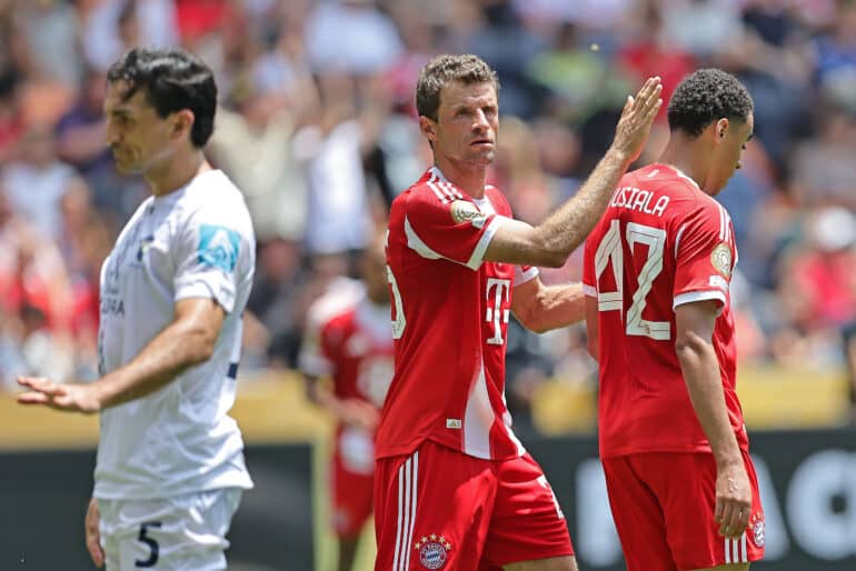 Jamal Musiala of FC Bayern Munich celebrates after scoring the seventh goal in the 67th minute with Thomas Muller, during the match between FC Bayern Munich and Auckland City, for the 1st round of group C for the FIFA Club World Cup 2025, in Cincinnati