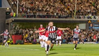 GOAL 1 - 0 Charles Vernam of Grimsby Town scores a goal and celebrates during the EFL Cup match between Grimsby Town FC and Manchester United at Blundell Park, Grimsby