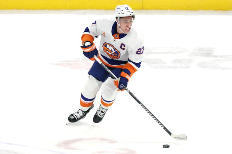 Feb 7, 2025; Winnipeg, Manitoba, CAN; New York Islanders left wing Anders Lee (27) skates through the neutral zone against the Winnipeg Jets in the third period at Canada Life Centre. Mandatory Credit: James Carey Lauder-Imagn Images
