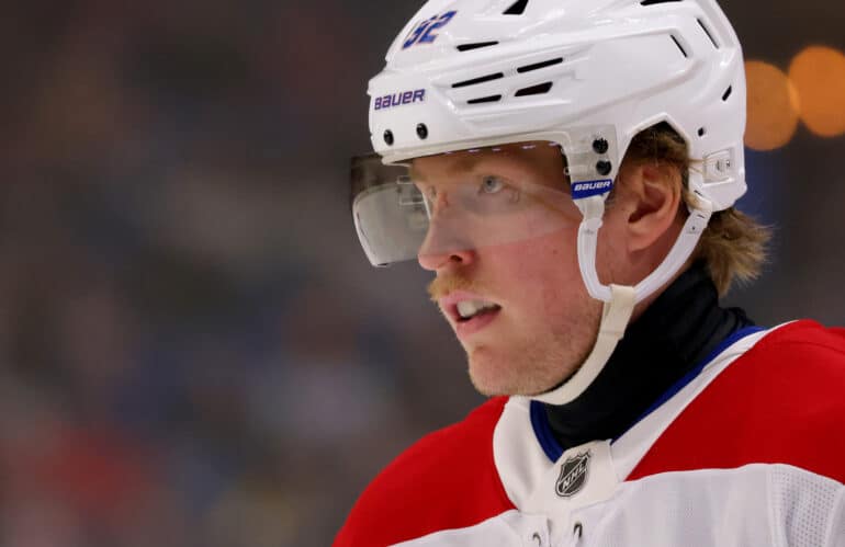 Mar 1, 2025; Buffalo, New York, USA;  Montreal Canadiens right wing Patrik Laine (92) waits for the face-off during the third period against the Buffalo Sabres at KeyBank Center. Mandatory Credit: Timothy T. Ludwig-Imagn Images