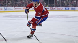 Oct 14, 2025; Montreal, Quebec, CAN; Montreal Canadiens defenseman Kaiden Guhle (21) takes a shot on net during the second period of the game against the Seattle Kraken at the Bell Centre. Mandatory Credit: Eric Bolte-Imagn Images