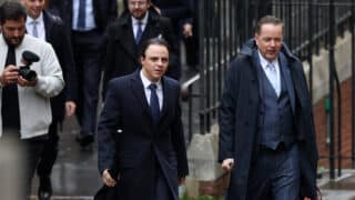 epa12495038 Former F1 racing driver Felipe Massa (C) arrives with his lawyers at the High Court in London, Britain, 31 October 2025. Seventeen years after losing the 2008 Formula 1 World Championship by a single point to Lewis Hamilton, Felipe Massa is taking legal action against Federation Internationale de l'Automobile (FIA) and former F1 boss Bernie Ecclestone. Massa is seeking around 80 million USD in damages.  EPA/ANDY RAIN