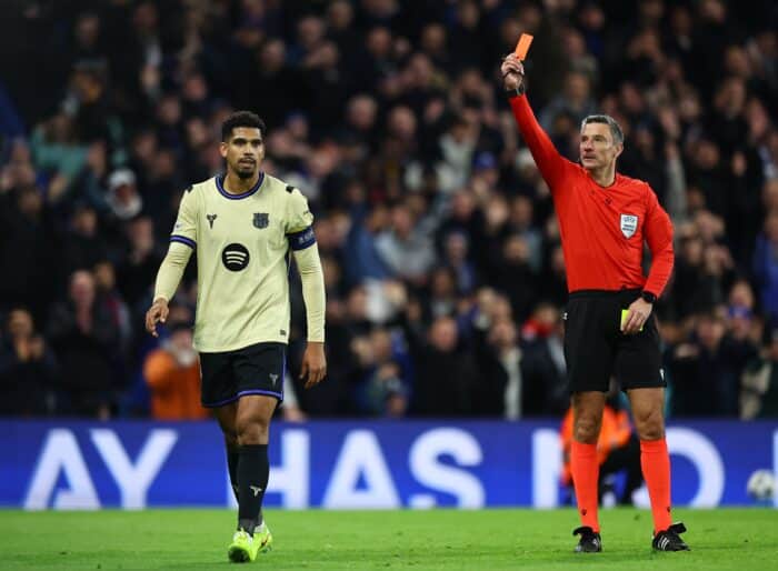Ronald Araujo of Barcelona is shown a red card