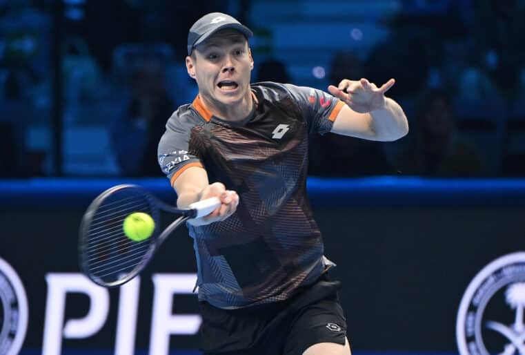 epa12527460 Harri Heliovaara of Finland in action during the doubles Round Robin match against Simone Bolelli of Italy and Andrea Vavassori of Italy at the ATP Finals in Turin, Italy, 15 November 2025.  EPA/ALESSANDRO DI MARCO