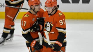 Apr 9, 2025; Anaheim, California, USA;  Anaheim Ducks left wing Cutter Gauthier (61) is congratulated by center Leo Carlsson (91) after a goal during the third period against the Calgary Flames as Honda Center. Mandatory Credit: Jayne Kamin-Oncea-Imagn Images