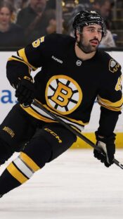 Young couple with rackets play squash game in indoor training club. Active sport lifestyle. Recreation workout, match with racquet