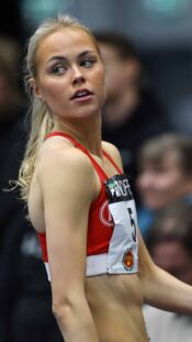 Jan 11, 2025; Salt Lake City, Utah, USA; Utah Hockey Club defenseman Olli Maatta (2) moves the puck against the New York Islanders during first period at the Delta Center. Mandatory Credit: Christopher Creveling-Imagn Images
