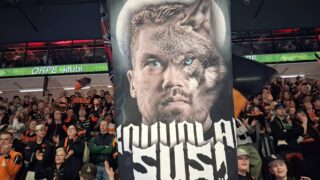 Miska Siikonen Kouvolan susi lakana juliste banderolli